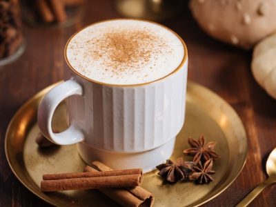 Cup,Of,Pumpkin,Spice,Late,With,Cinnamon,Sticks,,Pumpkins,Star